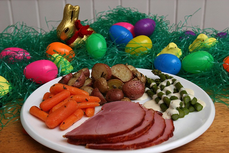 Of course you'll want the traditional spread for Easter dinner, but that doesn't mean you have to prepare it yourself. /File/AP Photo/Larry Crowe