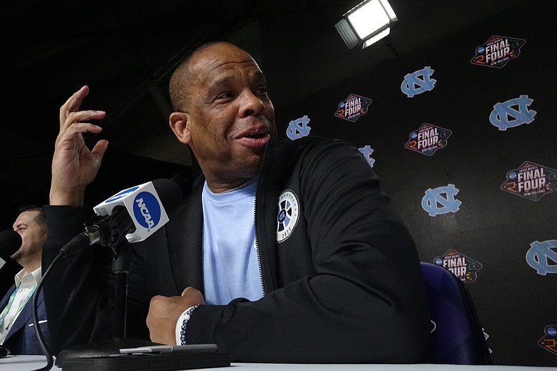 North Carolina head coach Hubert Davis speaks during a news conference about the Men's Final Four NCAA basketball tournament, Sunday, April 3, 2022, in New Orleans. North Carolina will face Kansas in the final game on Monday. (AP Photo/David J. Phillip)
