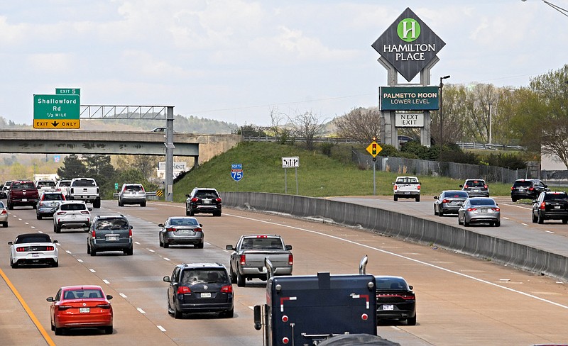Staff Photo by Robin Rudd / Interstate 75 traffic travels north, while cars take the exit, far right, to Hamilton Place Boulevard. The interchange on Interstate 75 at Hamilton Place Mall is part of the Tennessee Department of Transportation's three-year plan for 2022-25 and work should begin in 2023. The Hamilton County project was among six critical transportation projects in Tennessee.