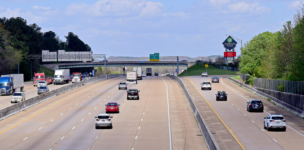 Staff Photo by Robin Rudd / Interstate 75 traffic moves, while cars take the exit, far right, to Hamilton Place Boulevard. The interchange on Interstate 75 at Hamilton Place Mall is part of the Tennessee Department of Transportation's three-year plan for 2022-25 and work should begin in 2023. The Hamilton County project was among six critical transportation projects in Tennessee.