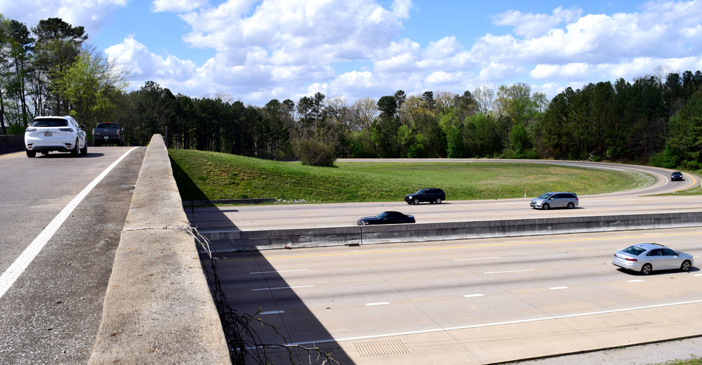 Staff Photo by Robin Rudd / Cars, at left, cross over Interstate 75 to merge with Southbound Interstate 75. The interchange on Interstate 75 at Hamilton Place Mall is part of the Tennessee Department of Transportation's three-year plan for 2022-25 and work should begin in 2023. The Hamilton County project was among six critical transportation projects in Tennessee.