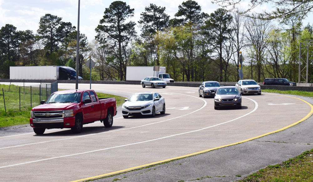 Staff Photo by Robin Rudd / Traffic uses the ramp from Interstate 75 to access Hamilton Place Boulevard. The interchange on Interstate 75 at Hamilton Place Mall is part of the Tennessee Department of Transportation's three-year plan for 2022-25 and work should begin in 2023. The Hamilton County project was among six critical transportation projects in Tennessee.
