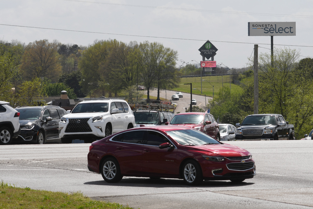 Staff Photo by Robin Rudd / A car, foreground, turns onto the on-ramp to Interstate 75, from Shallowford Road. The interchange on Interstate 75 at Hamilton Place Mall is part of the Tennessee Department of Transportation's three-year plan for 2022-25 and work should begin in 2023. The Hamilton County project was among six critical transportation projects in Tennessee.