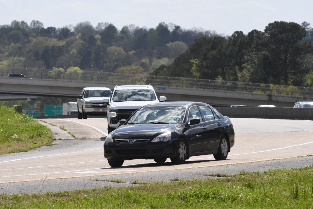 Staff Photo by Robin Rudd / Traffic uses the ramp from Interstate 75 to access Hamilton Place Boulevard. The interchange on Interstate 75 at Hamilton Place Mall is part of the Tennessee Department of Transportation's three-year plan for 2022-25, and work should begin in 2023. The Hamilton County project was among six critical transportation projects in Tennessee.