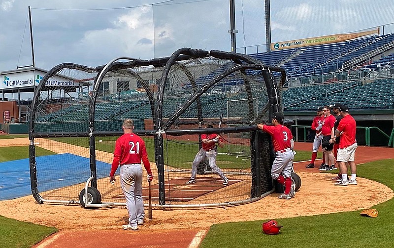 Lookouts photo by Alex Tainsh / Members of the Chattanooga Lookouts go through batting practice Thursday afternoon at AT&T Field in preparation for Friday night's season opener in Kodak against the Tennessee Smokies.
