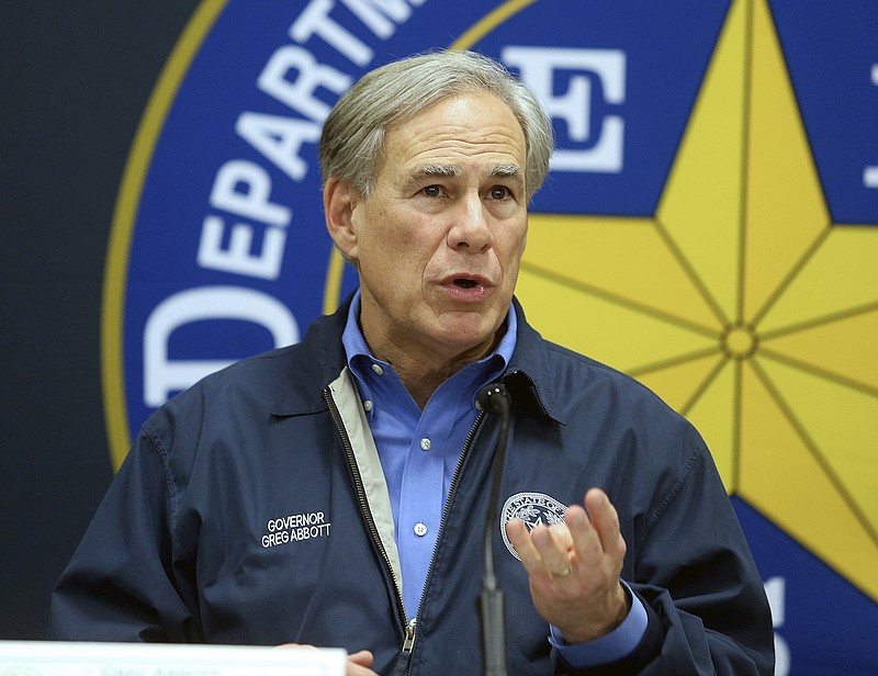 File photo by Joel Martinez/The Monitor via The AP / Texas Gov. Greg Abbott speaks during a news conference on March 10, 2022, in Weslaco, Texas. Abbott says he will he announce "unprecedented actions" to deter migrants coming to Texas.