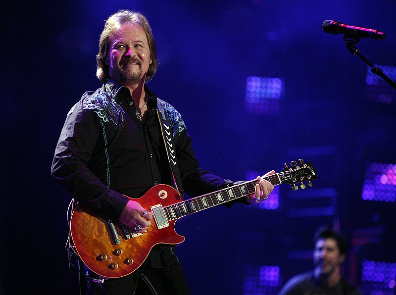 Travis Tritt performs during the CMA Fest at LP Field on Friday, June 6, 2014, in Nashville. He'll be in concert April 22 at the Dalton Convention Center. /Photo by Wade Payne/Invision/AP