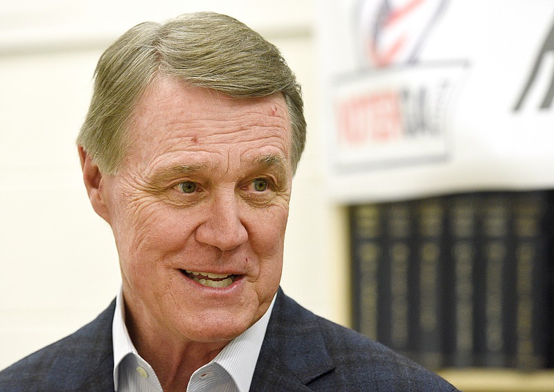 Staff Photo by Matt Hamilton / David Perdue talks to a supporter at the Northwest Georgia headquarters for Voters Organized for Trusted Election Results in Georgia, in Ringgold, Ga., on Thursday, April 14, 2022.