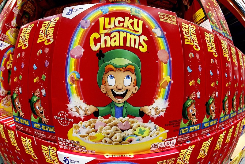 Boxes of General Mills' Lucky Charms cereal are seen on a shelf at a Costco Warehouse in Robinson Township, Pa., Thursday, May 14, 2020. (AP Photo/Gene J. Puskar, File)