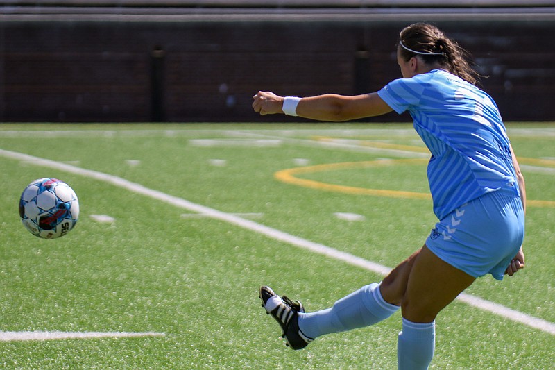 Staff photo by Olivia Ross  / Avery Catlett sends the ball up the field. CFC Women took on Alabama FC at Finley Stadium on June 11, 2022.