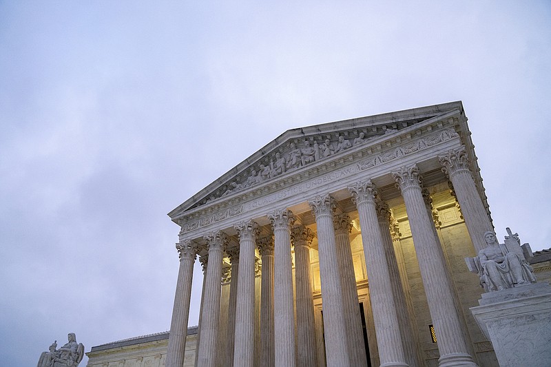 Photo by Stefani Reynolds of The New York Times / The Supreme Court building is shown in Washington on Oct. 12, 2021.