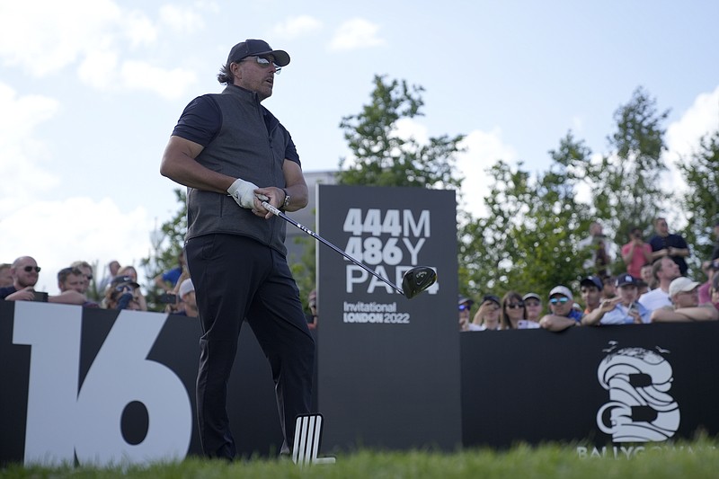 Phil Mickelson of the United States waits to play his tee shot on the 16th hole during the final round of the inaugural LIV Golf Invitational at the Centurion Club in St Albans, England, Saturday, June 11, 2022. (AP Photo/Alastair Grant)