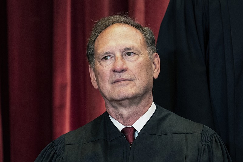 File photo by Erin Schaff/The New York Times via The AP/pool / Associate Justice Samuel Alito sits during a group photo at the Supreme Court in Washington on April 23, 2021. The Supreme Court has ended constitutional protections for abortion that had been in place nearly 50 years, a decision by its conservative majority to overturn the court's landmark abortion cases. In the final opinion, Alito wrote that the court "cannot allow our decisions to be affected by any extraneous influences such as concern about the public's reaction to our work."