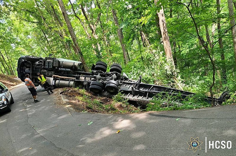 An overturned semi-truck is seen on Cash Canyon Road in Chattanooga on Thursday, June 30, 2022. / Photo courtesy of Hamilton County Sheriff's Office