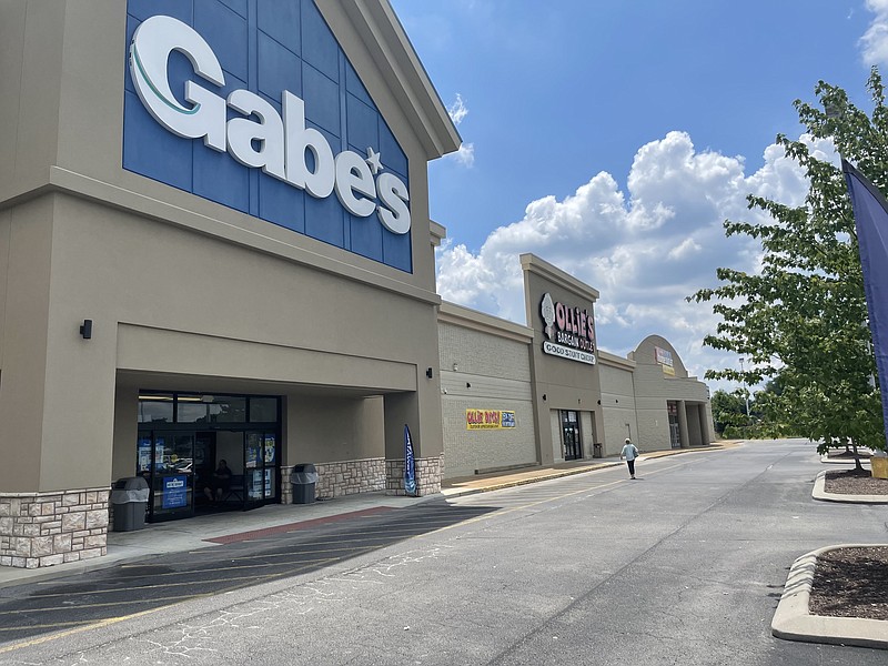 Photo by Dave Flessner / A shopper enters one of the retail stores in the Issa Crossing shopping center in Hixson, which was sold last week to an Ontario, Canada investor for $10.75 million. Photo taken July 1, 2022.