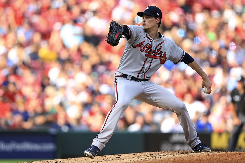 AP photo by Aaron Doster / Atlanta Braves starter Max Fried pitches during Friday night's game against the host Cincinnati Reds.