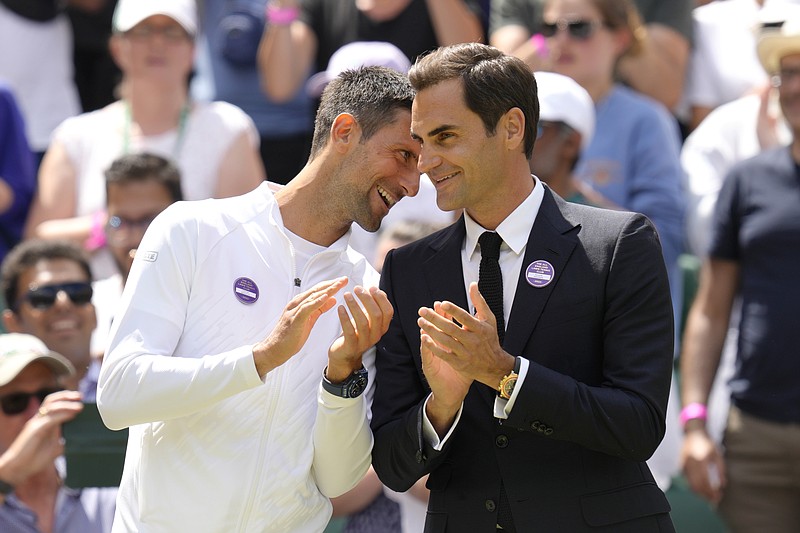 AP photo by Kirsty Wigglesworth / From left, Novak Djokovic and Roger Federer were among the past Wimbledon champions who took part in Sunday's 100 years of Centre Court celebration at the All England Club.