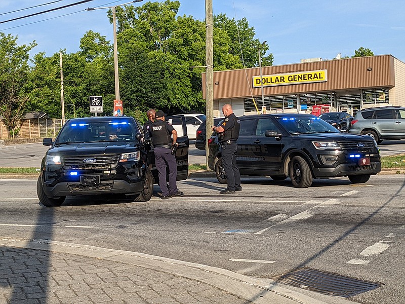 Staff File Photo by Tierra Hayes / The Chattanooga Police Department investigates near the 2100 block of McCallie Avenue following a shooting on June 5.