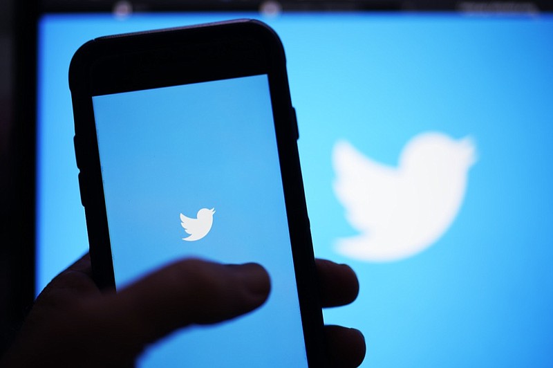 The Twitter application is seen on a digital device, April 25, 2022, in San Diego. (AP Photo/Gregory Bull, File)