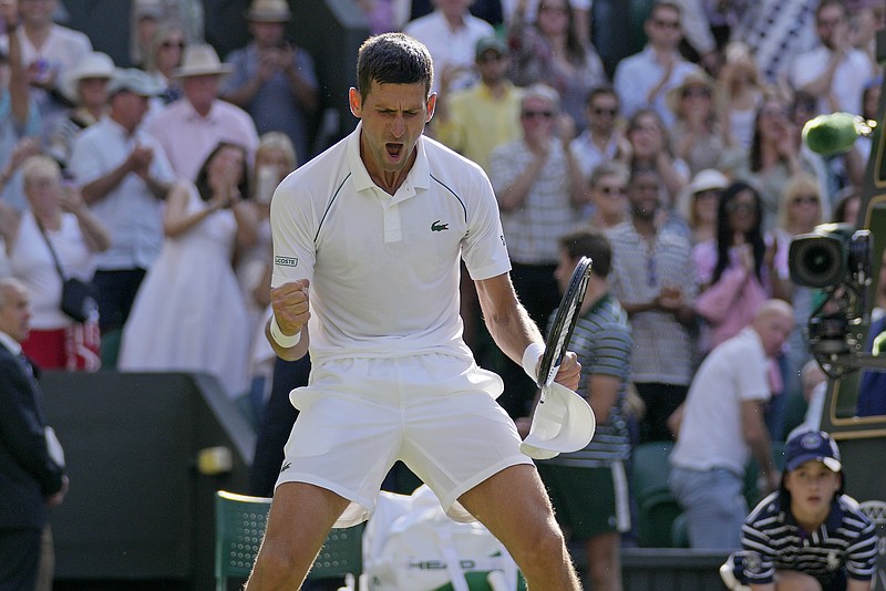 AP photo by Alastair Grant / Novak Djokovic celebrates after beating Cam Norrie 2-6, 6-3, 6-2, 6-4 in a semifinal Friday at Wimbledon. Djokovic, the tournament's three-time reigning champion, will face Nick Kyrgios in Sunday's title match at the grass court Grand Slam.