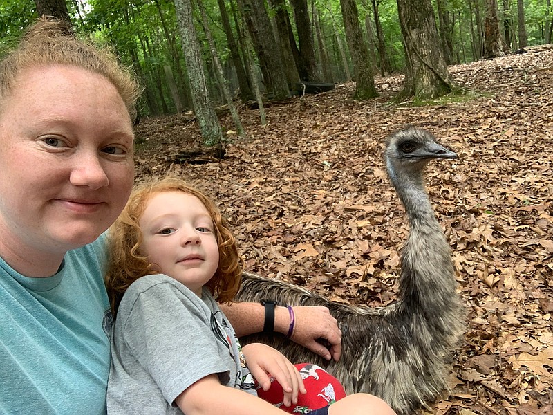 Contributed Photo by Hannah Pendergrass / Hannah Pendergrass, with her son, Henry, 4, sent this selfie to Leslie Holdman to let Holdman know her missing emu, Bobo, had been found safe nearby.