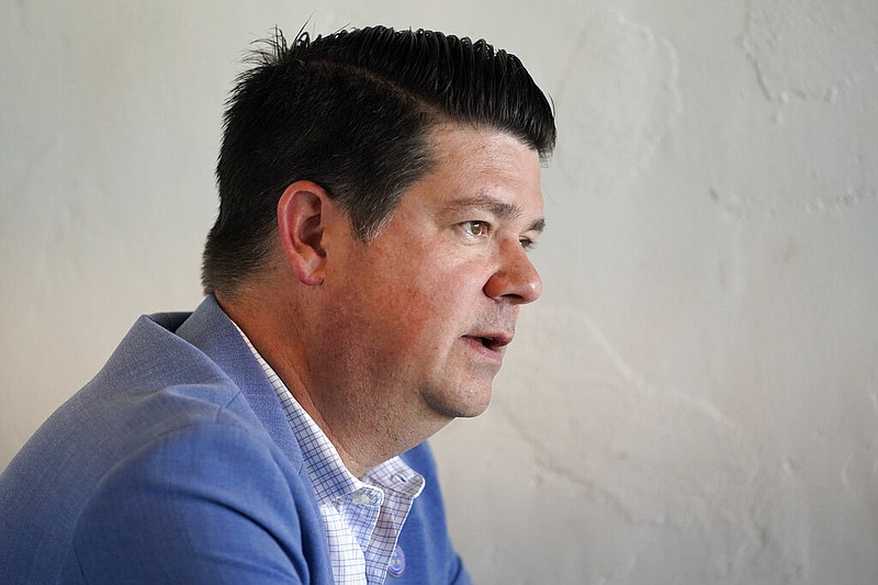 Dr. Jason Martin answers a question during an interview July 11, in Nashville. Martin, a critical care physician from Nashville, is one of three Democrats running for Tennessee Gov. Bill Lee's job. (AP Photo/Mark Humphrey)