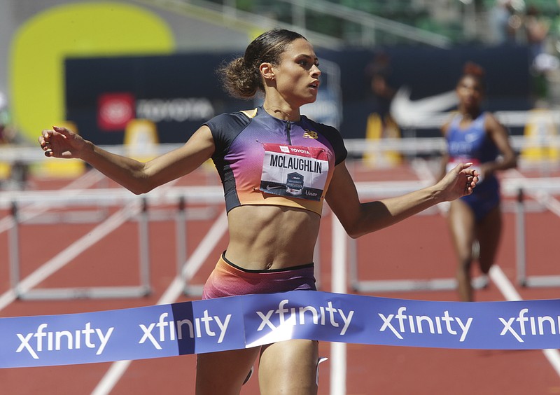 Sydney McLaughlin crosses the finish line to set a new world record in the women's 400 meter hurdles at the U.S. outdoor track and field championships in Eugene, Ore on June 25.