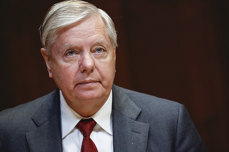 Sen. Lindsey Graham, R-S.C., listens during a hearing on the fiscal year 2023 budget for the FBI in Washington, on May 25, 2022. Attorneys for Graham said in a court filing on July 13, he wasn't trying to interfere in Georgia's 2020 election when he called state officials to ask them to reexamine certain absentee ballots after President Donald Trump's narrow loss to Democrat Joe Biden. (Ting Shen/Pool Photo via AP, File)