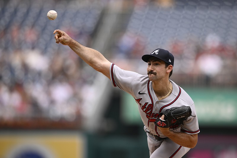 AP photo by Nick Wass / Atlanta Braves starter Spencer Strider pitches during Sunday's loss to the host Washington Nationals, who avoided being swept in the four-game series by ending a nine-game losing streak.