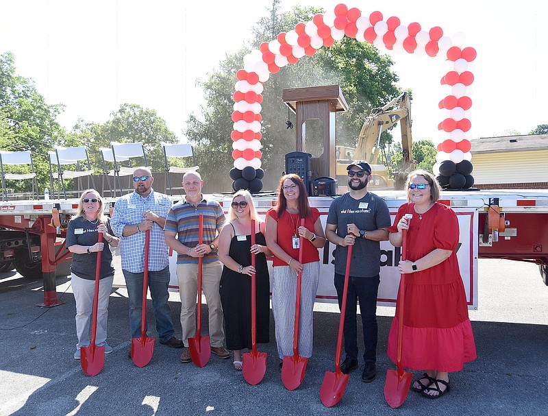 Staff photo by Matt Hamilton / From left, Beth Kasch, Ben Lyle, Ethan Collier, Chloe Hasden, Shannon Romans, Bryan White and Katie Harbison hold shovels for the groundbreaking ceremony of the Isaiah 117 House at the Chambliss Center for Children.