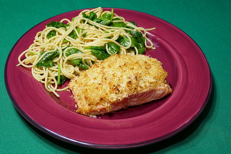 Parmesan-Crusted Salmon with Spaghetti and Spinach. / Photo by Linda Gassenheimer/TNS