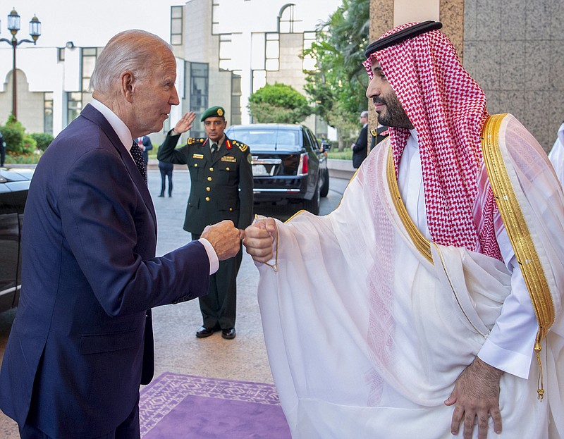 Photo by Bandar Aljaloud/Saudi Royal Palace via The AP / In this image released by the Saudi Royal Palace, Saudi Crown Prince Mohammed bin Salman, right, greets President Joe Biden with a fist bump after his arrival at Al-Salam palace in Jeddah, Saudi Arabia on July 15, 2022.