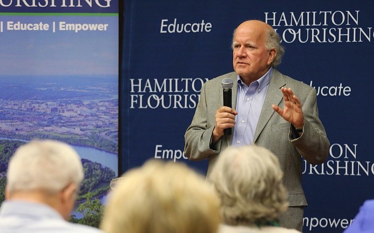 Staff photo by Erin O. Smith / Doug Daugherty, president of Hamilton Flourishing, introduces Stuart and Tamarah Goggans during an event at the Chattanooga Public Library Tuesday, August 20, 2019 in Chattanooga, Tennessee. The event was part of Hamilton Flourishing's monthly educational event series. 