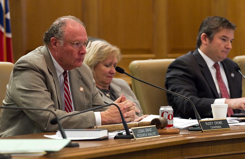 Chairman Rusty Crowe, R- Johnson City, presides over a Senate Health Committee meeting Feb. 4, 2015, in Nashville about Gov. Bill Haslam's proposal to extend health coverage to 280,000 low-income residents. To the right are Sens. Becky Duncan Massey, R-Knoxville, and Jeff Yarbro, D-Nashville. (AP Photo/Erik Schelzig)