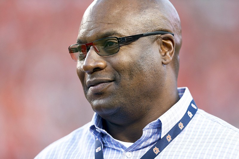 FILE - Former MLB and NFL player Bo Jackson, watches Auburn and Clemson practice before an NCAA college football game Saturday, Sept. 3, 2016, in Auburn, Ala. Jackson helped pay for the funerals of the 19 children and two teachers killed in the Uvalde school massacre in May. The donation was previously anonymous but Jackson told The Associated Press this week he felt compelled to support the victims' families after the loss of so many children. (AP Photo/Brynn Anderson, File)