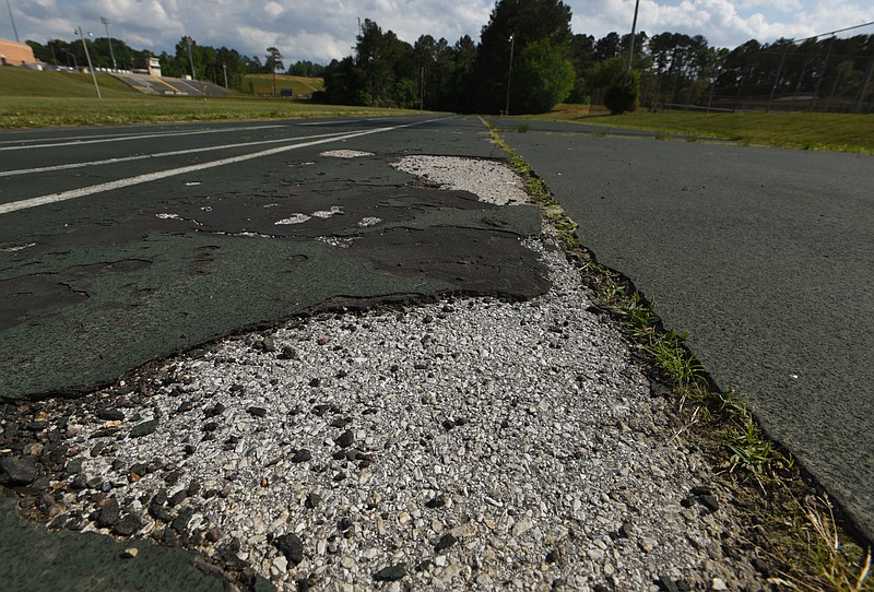 Staff File Photo / The track at Central High School, shown in poor condition in 2015, has been revitalized and now will get lights and bleachers.