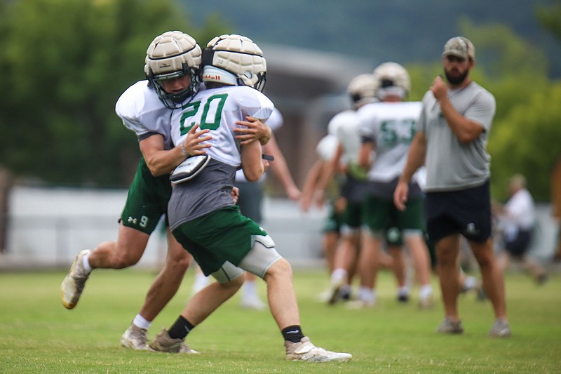 Staff photo by Olivia Ross  / Silverdale Baptist Academy practices early Monday morning on July 25, 2022. Today is the first day that high school prep teams in Tennessee are able to practice in full pads. 