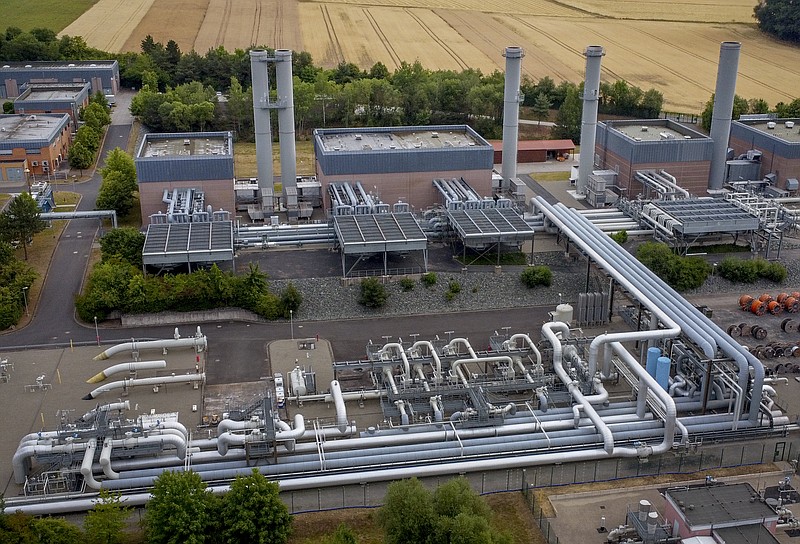 FILE - The gas storage plant Reckrod is pictured near Eiterfeld, central Germany, Thursday, July 14, 2022, after the Nord Stream 1 pipeline was shut down due to maintenance. European Union governments agreed Tuesday, July 26, 2022 to ration natural gas this winter to protect themselves against any further supply cuts by Russia as Moscow pursues its invasion of Ukraine. (AP Photo/Michael Probst, File)