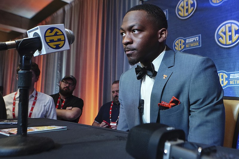 Tennessee quarterback Hendon Hooker speaks during NCAA college football Southeastern Conference Media Days, Thursday, July 21, 2022, in Atlanta. (AP Photo/John Bazemore)