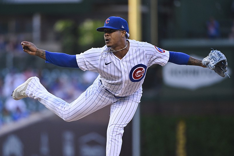 FILE - Chicago Cubs starting pitcher Marcus Stroman watches a throw to an Arizona Diamondbacks batter during the first inning of a baseball game in Chicago, Thursday, May 19, 2022. Stroman takes pregame grounders at second base and shortstop. He takes his defense seriously — especially for a pitcher. (AP Photo/Matt Marton, File)