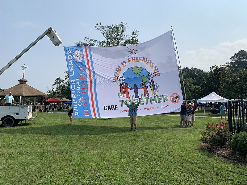 Contributed Photo by Susan Locklear / At last year's Friendship Festival, organizers hoisted a giant flag as part of their mission to secure Summerville, Georgia, as the Friendship Capital of the World.