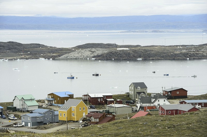 FILE - Small boats make their way through the Frobisher Bay inlet in Iqaluit, Nunavut, Canada on Friday, Aug. 2, 2019. In his extensive papal travels, Pope Francis has never journeyed further north than Iqaluit, the capital city of the Inuit-governed territory of Nunavut in northern Canada. On Friday, July 28, 2022, it will be the third and final stop of the pope's six-day Canadian visit, focused on apologies for abuses of Indigenous youths at Catholic-run boarding schools.(Sean Kilpatrick/The Canadian Press via AP, File)