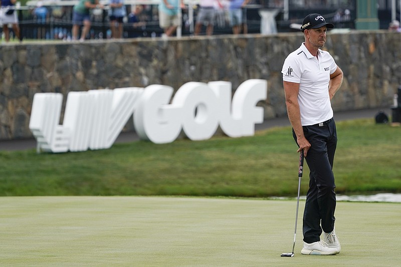 AP photo by Seth Wenig / Henrik Stenson watches play on the 18th hole at Trump National Golf Club Bedminster on Friday during the first round of an LIV Golf tournament in New Jersey.