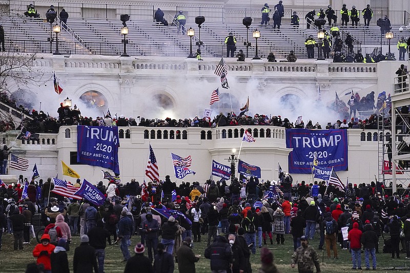 Violent insurrectionists loyal to President Donald Trump, storm the Capitol, Jan. 6, 2021, in Washington. (AP Photo/John Minchillo, File)
