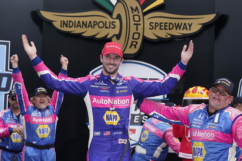 AP photo by Darron Cummings / Alexander Rossi celebrates after winning Saturday's IndyCar race on the road course at Indianapolis Motor Speedway.