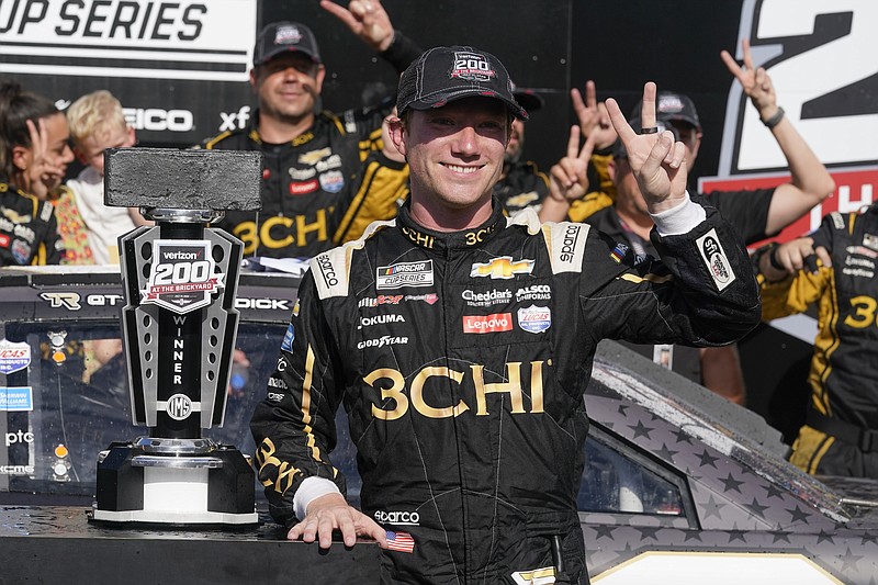 AP photo by Darron Cummings / NASCAR driver Tyler Reddick celebrates after winning Sunday's race on the road course at Indianapolis Motor Speedway for the second victory of his Cup Series career.