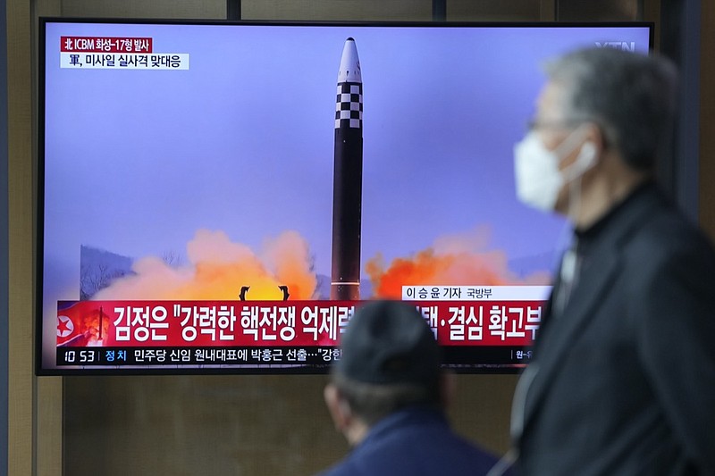 FILE - People watch a television screen showing a news program reporting about North Korea's intercontinental ballistic missile (ICBM) at a train station in Seoul, South Korea, Friday, March 25, 2022. A major United Nations meeting on the landmark nuclear Non-Proliferation Treaty is starting Monday, Aug. 1, 2022, after a long delay due to the COVID-19 pandemic, as Russia's war in Ukraine has reanimated fears of nuclear confrontation and cranked up the urgency of trying reinforce the 50-year-old treaty. (AP Photo/Lee Jin-man, File)