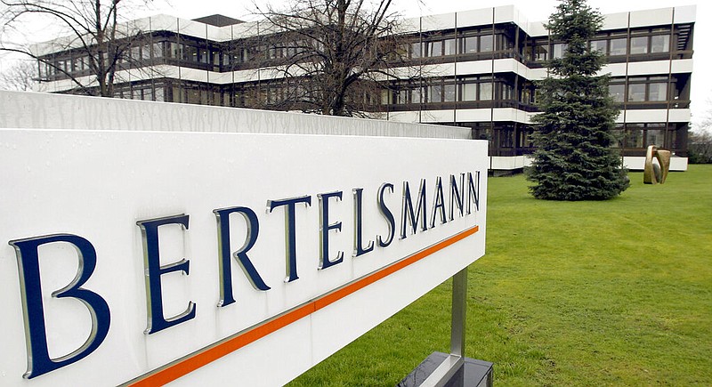 An outside view of the German media giant Bertelsmann in Guetersloh, Germany, is shown March 13, 2003. The government and publishing titan Penguin Random House, owned by Bertelsmann, are set to exchange opening salvos in a federal antitrust trial Monday, Aug. 1, 2022, as the U.S. seeks to block the biggest U.S. book publisher from absorbing rival Simon & Schuster. (AP Photo/Michael Sohn, File)