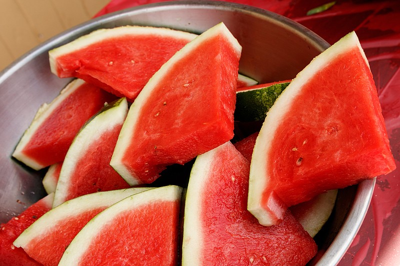 Staff File Photo / Watermelon is often served by the slice, but don't overlook its potential in recipes, such as Watermelon Goat Cheese Salad.