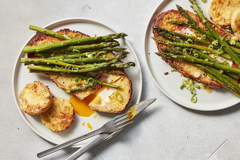 With Egg-in-a-hole With Asparagus, roasted asparagus and toasts dipped in a Parmesan-infused custard turn a childhood favorite into so much more. / Christopher Testani/The New York Times